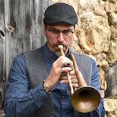 David Cooper playing trumpet