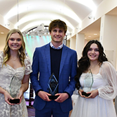 Students jackie calderon, tristan morneault, and gracie rouland pose with their awards