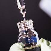 syringe drawing liquid