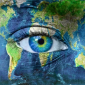 Human eye with planet earth colors