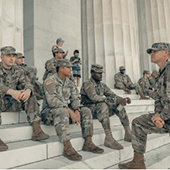Soldiers in uniform on steps
