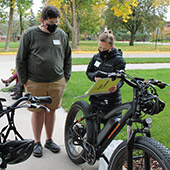 two electric bikes and riders