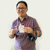 Hubert Lim with tinnitus device