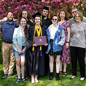 The Rentz family pose for a photo with the most recent graduate