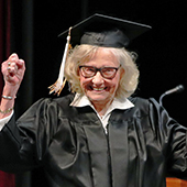 Betty Sandison reacts as she gets her degree