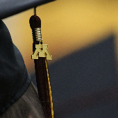 Graduation cap with M tassle