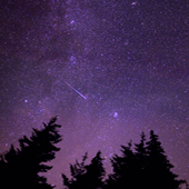meteor shower in night sky