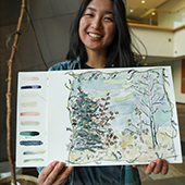 Maria Park with painting she made