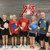 Pickleball players pose for photo