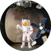 An astronaut that is part of a diorama