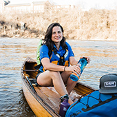 Natalie Warren in the front of her canoe