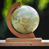 a globe on a wooden stand