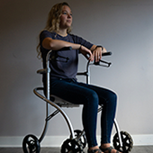 Morgan Kerfield sits on a Telo designed walker