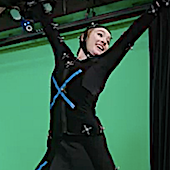 a student strikes a pose while wearing motion tracking clothing