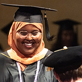 Warda Hussein in cap and gown at ceremony