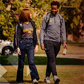 Two crookston students walk across campus