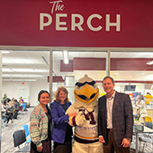President Ettinger, Rocky the Raptor, UMR chancellor and others pose 