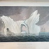 A painting of an ice berg from the North Pole pop-up exhibit