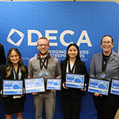 Students pose with certificate awards at the DECA State Career Development Conference