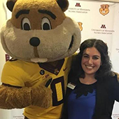 Marissa, a woman with dark hair, with Goldy Gopher Mascot
