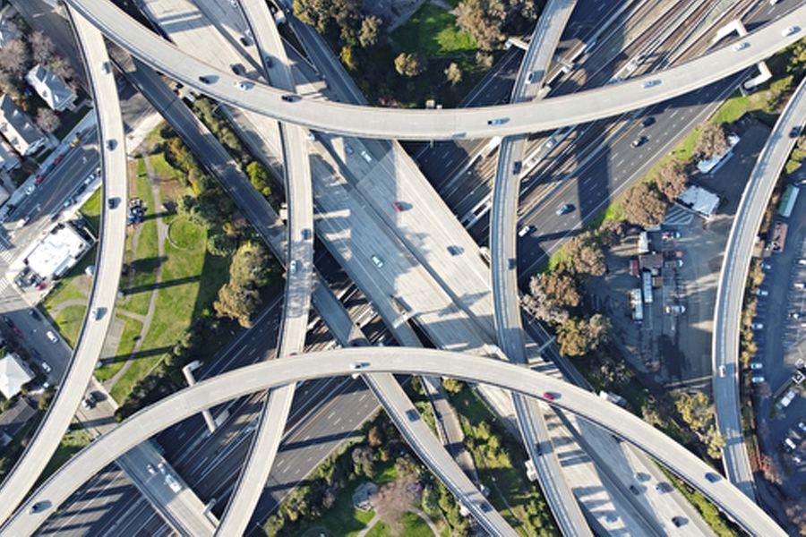  Aerial view of a complex freeway interchange.