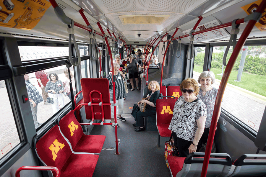 Participants at Age-Friendly University Day in 2025 ride a Campus Connector for a campus tour.