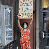 Jessica Bontemps holding black lives matter sign